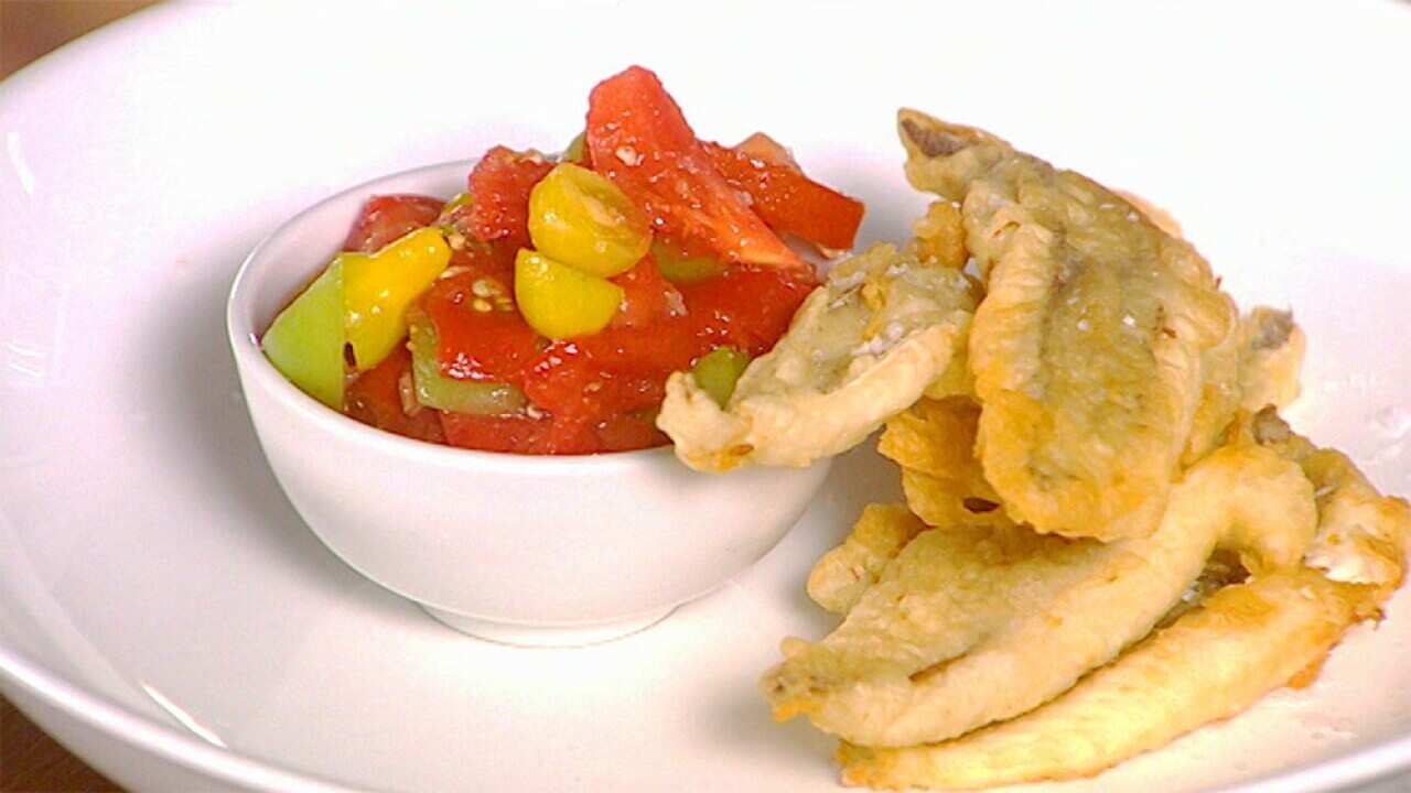 Deep-fried snapper fillets with lively tomato salad