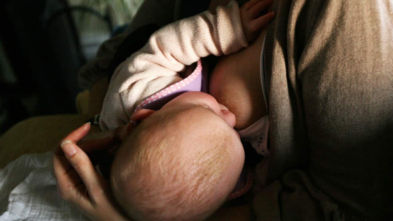 a baby breastfeeding