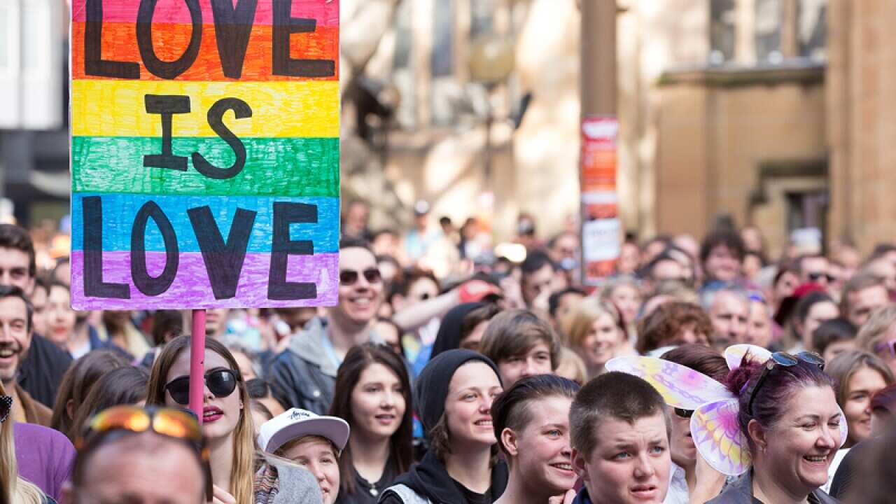 Same-Sex marriage activists march in the street during a Same-Sex Marriage rally in Sydney