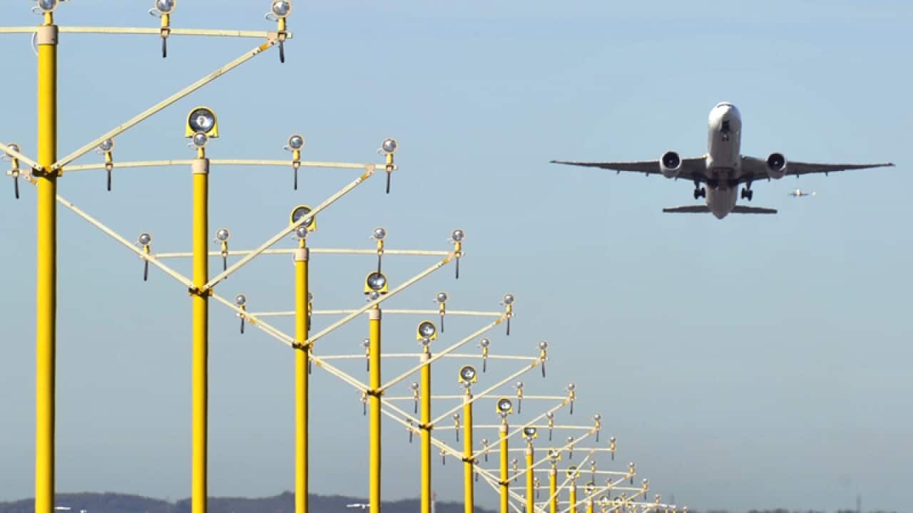 An aircraft seen departing