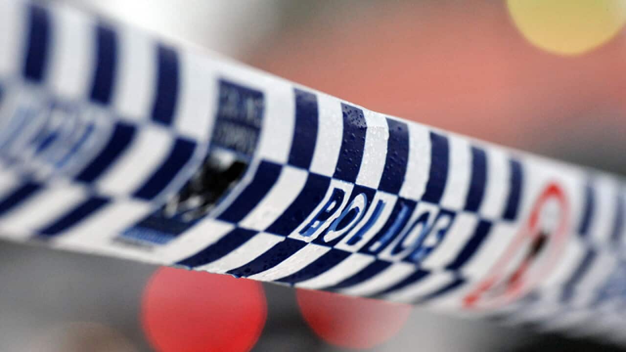 Police tape restricts access