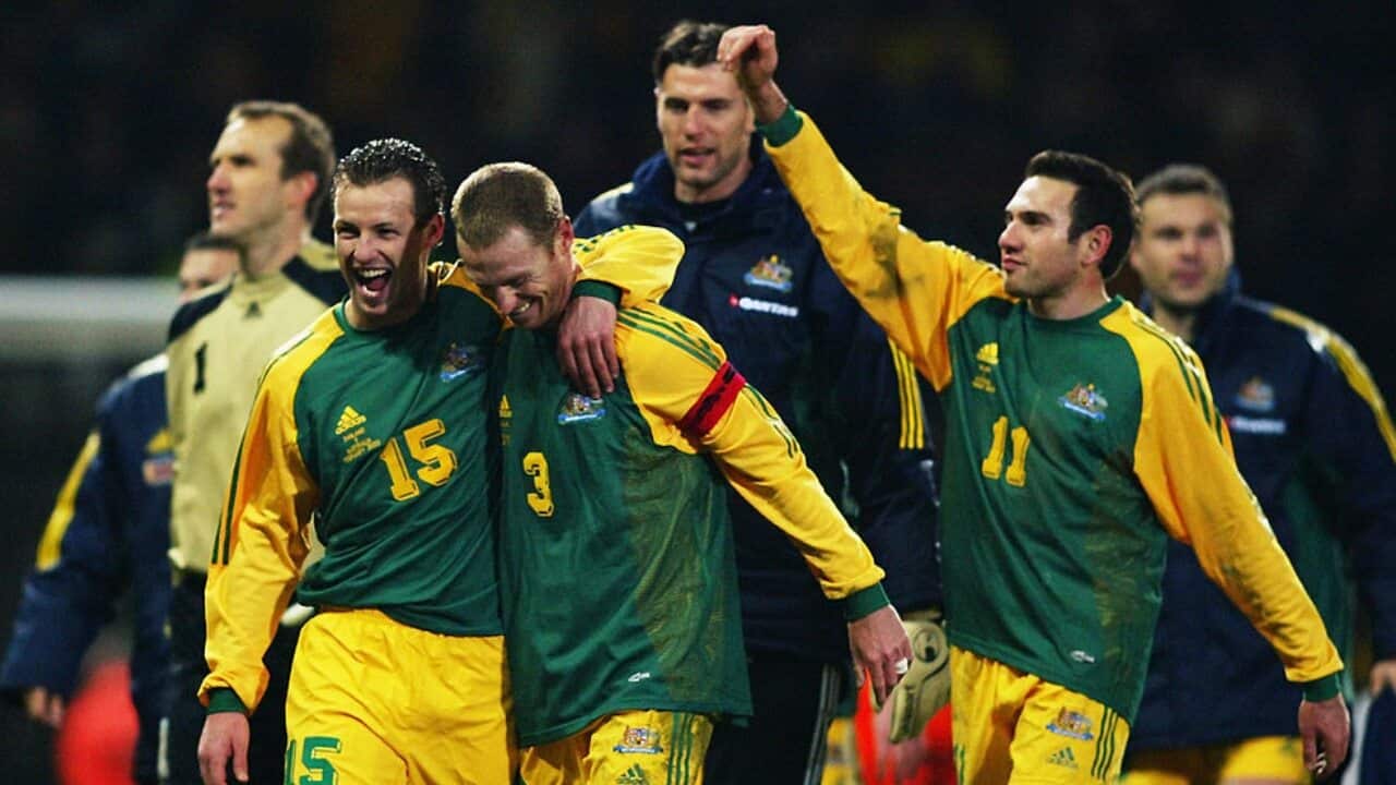 The Socceroos celebrate their victory over England in 2003
