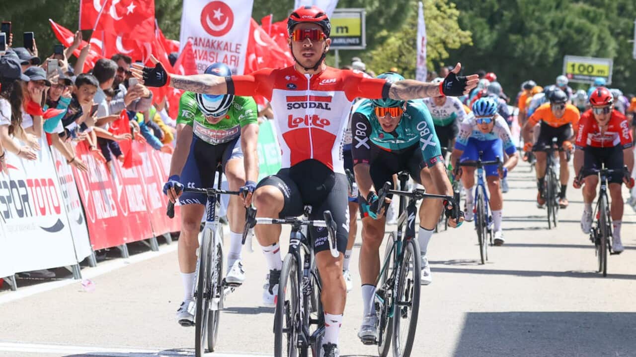 Caleb Ewan celebrates his victory