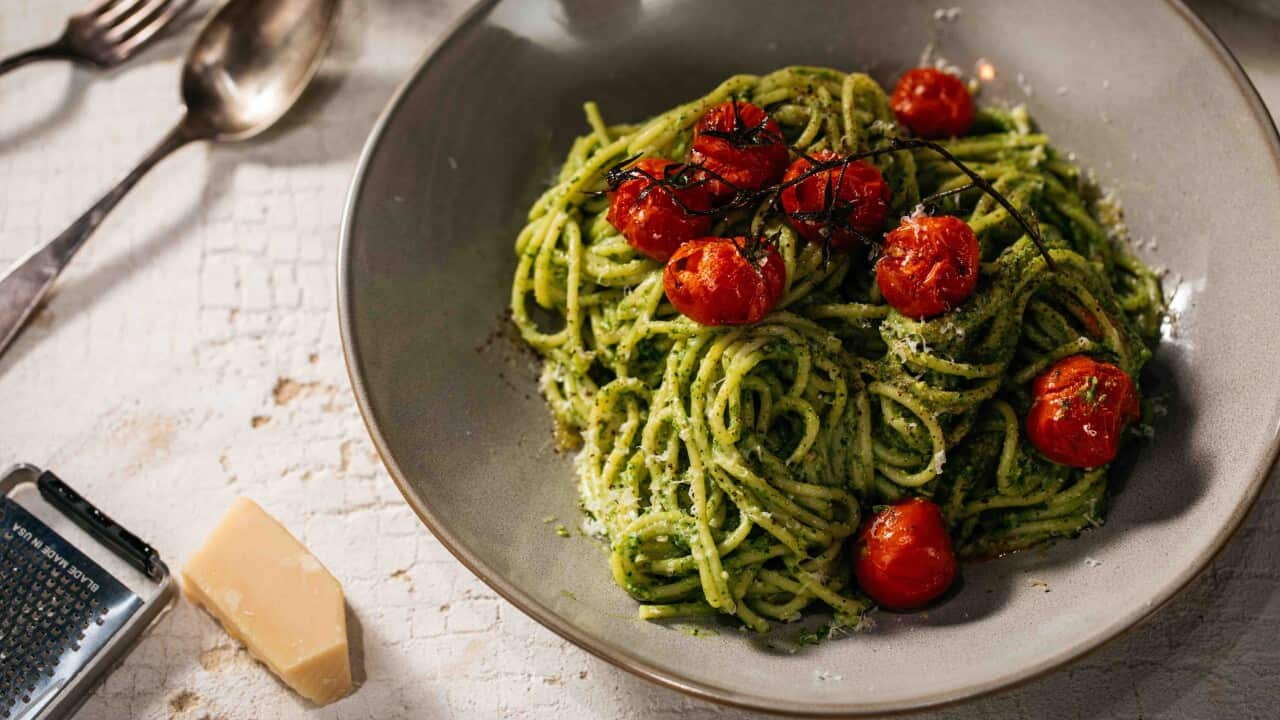 Pesto pasta with blistered baby vine tomatoes