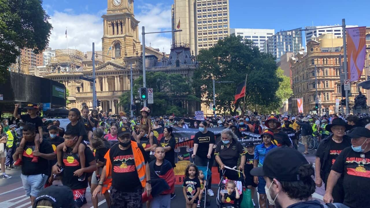 Thousands take part in Invasion Day protests in Sydney's CBD.