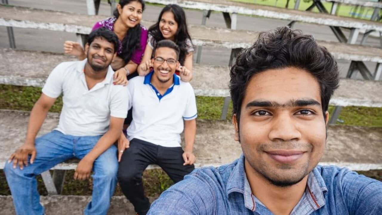Portrait Of Friends Enjoying At Park