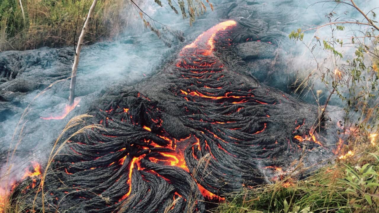lava flow burning vegetation on the Big Island of Hawaii