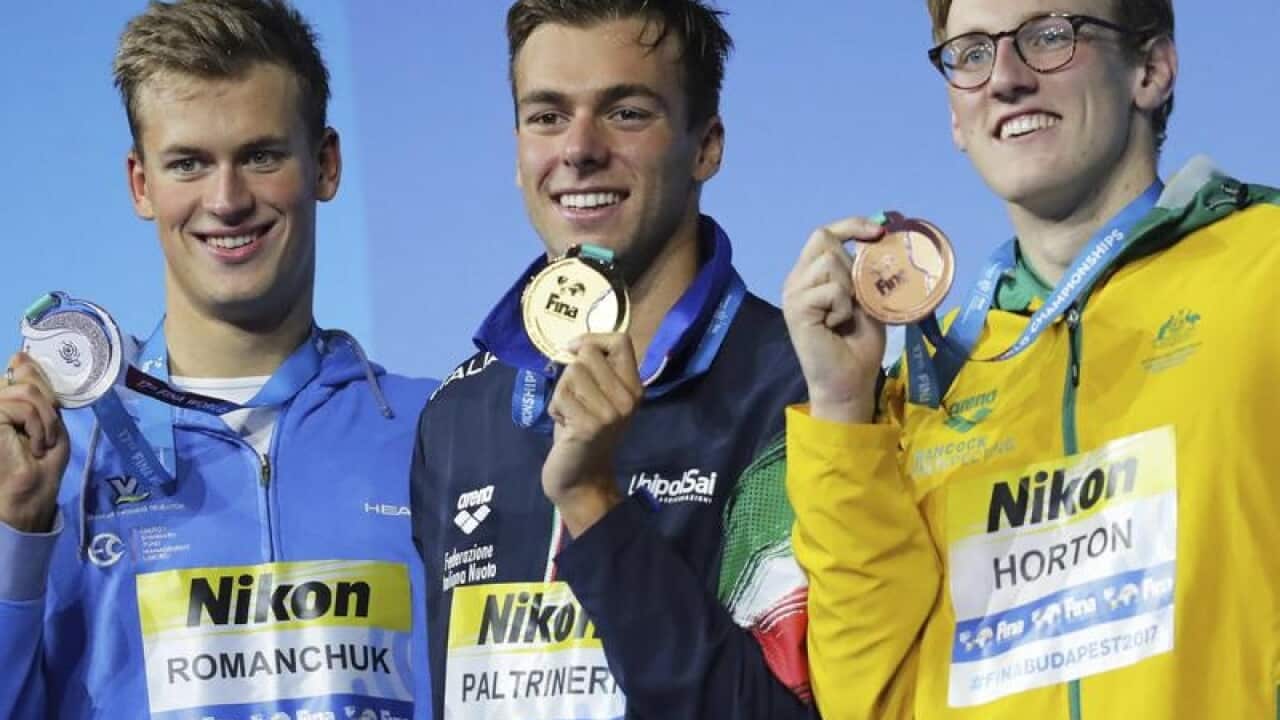 (L to R) Romanchuk, Paltrinieri, winner, and Horton