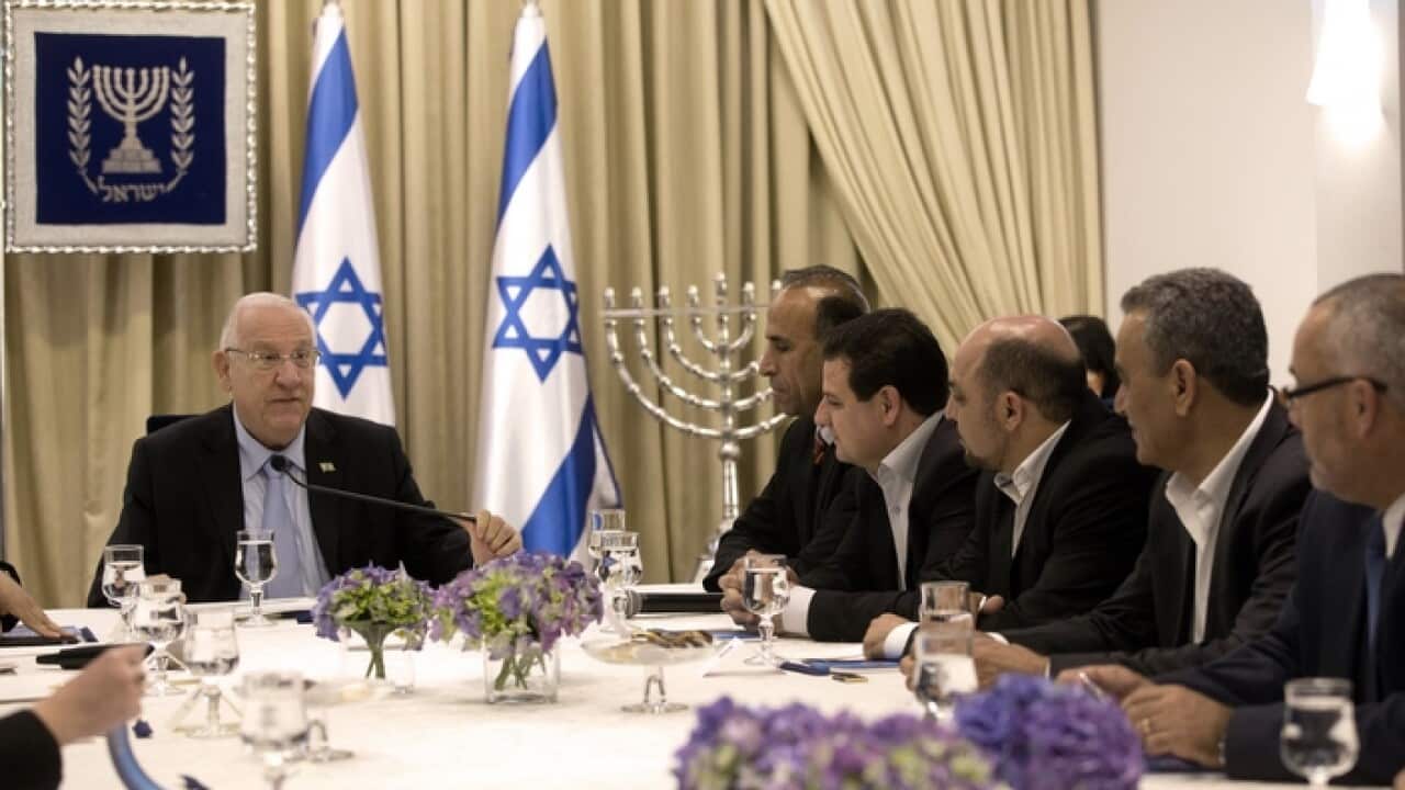 Israel's President Reuven Rivlin (L) in consultations with political leaders