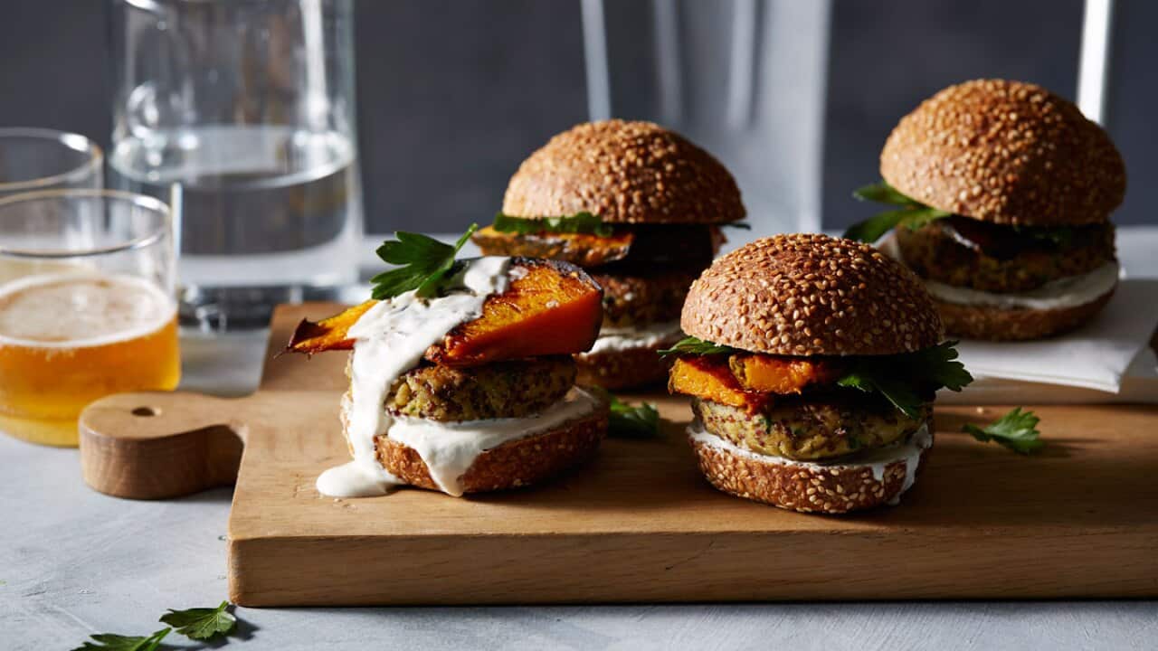 Vegetarian chickpea and quinoa burgers with roasted pumpkin