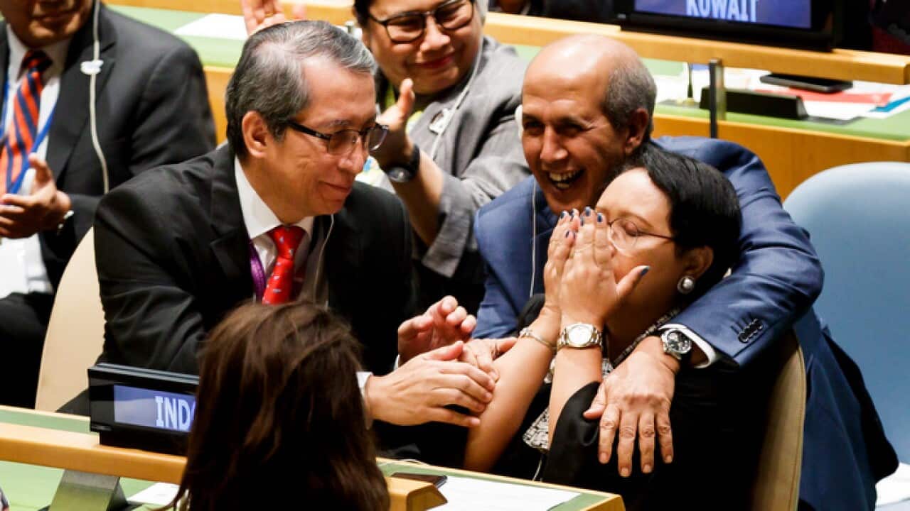 Indonesian Foreign Minister Retno Marsudi and her delegation react after Indonesia was elected to the United Nations Security Council.