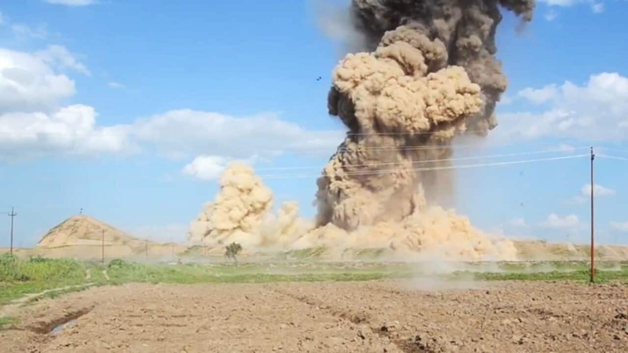 A still from a video purporting to show the destruction of Nimrud