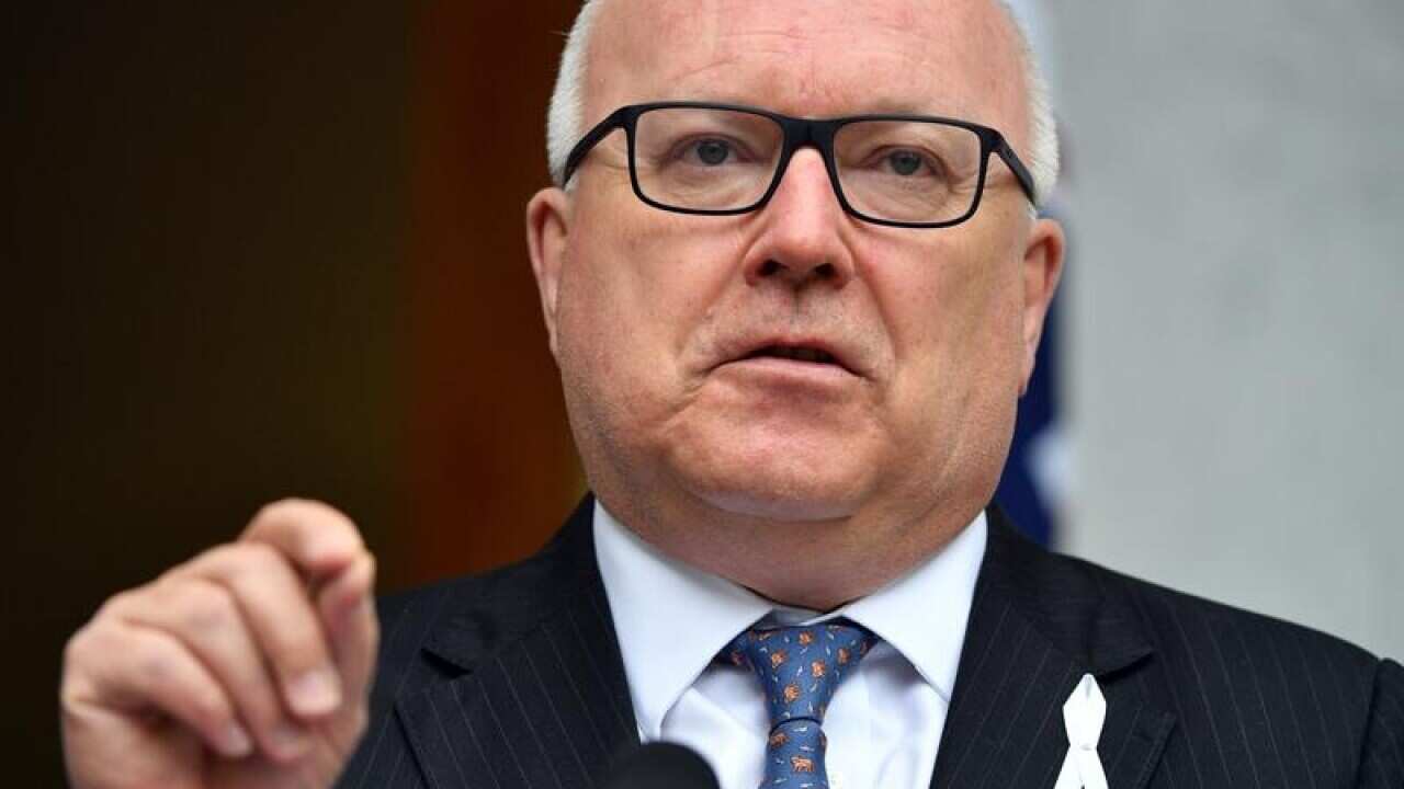 Former Attorney-General George Brandis at a press conference