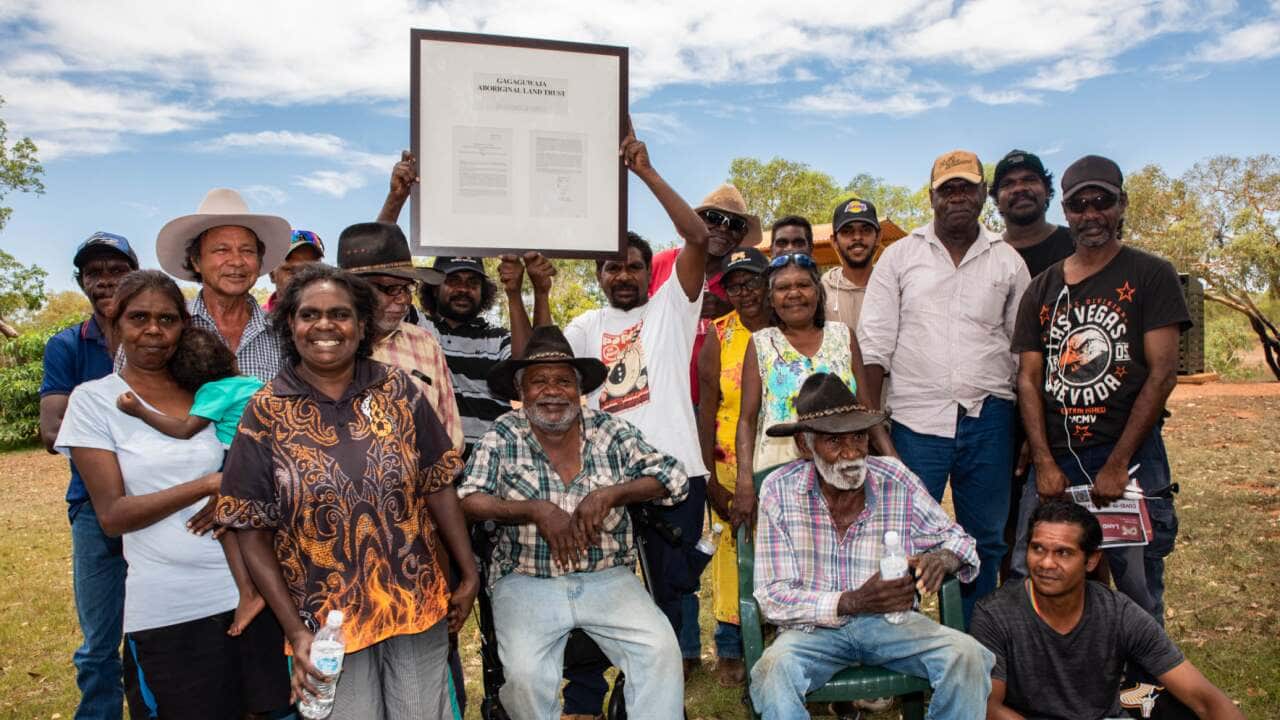 Photo of Traditional Owners at handback of Gagaguwaja Aboriginal Land Trust