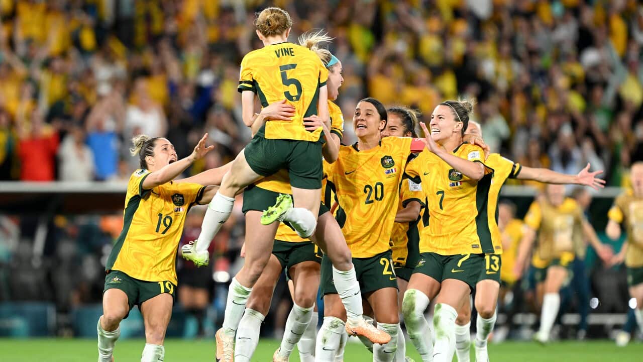 Cortnee Vine celebrates with her Matildas team mates after the game against France.