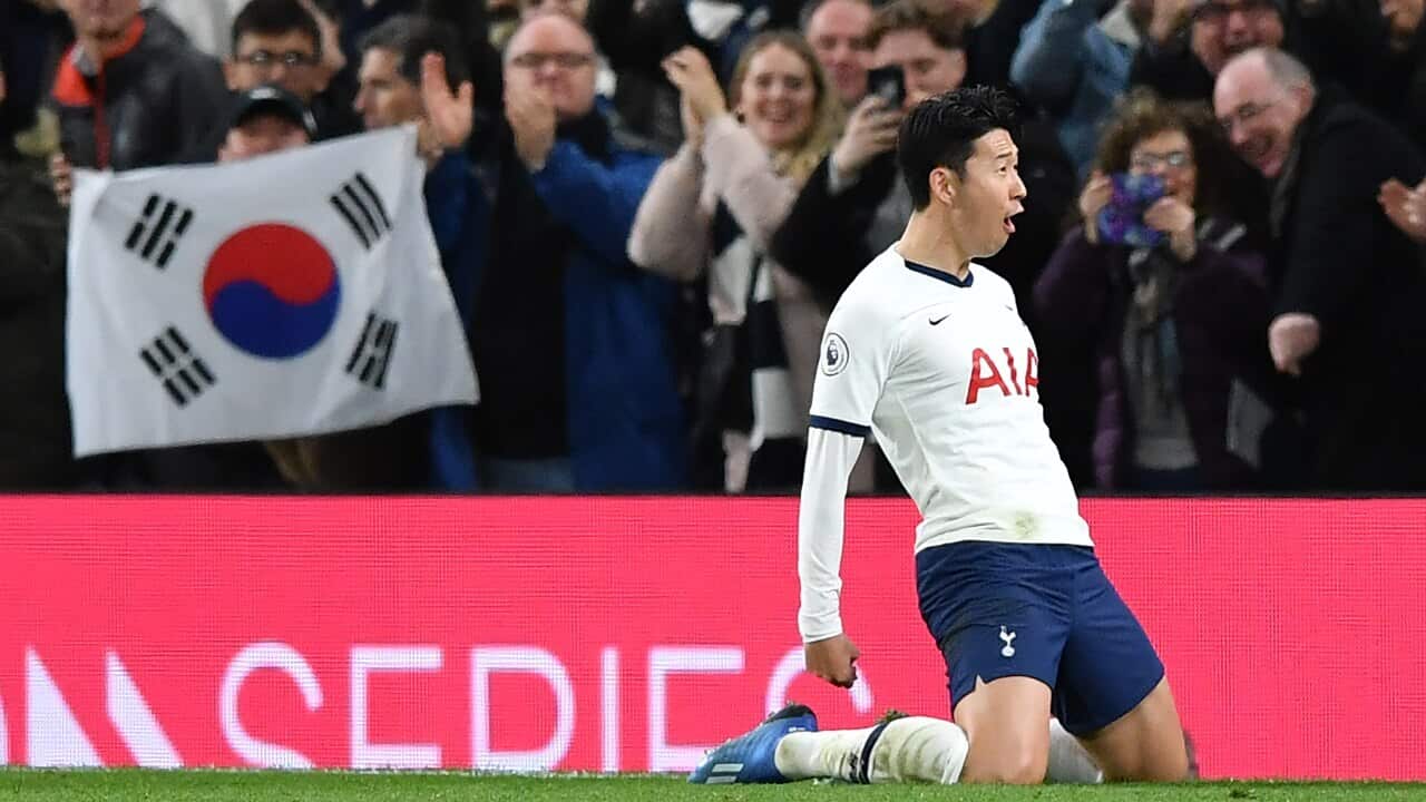A South Korean fan celebrates Son Heung-min's goal for Tottenham