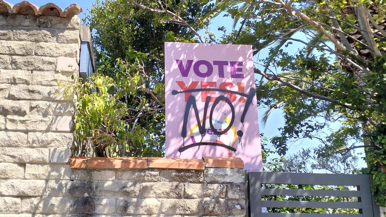 A poster saying vote yes, with a no written over it.