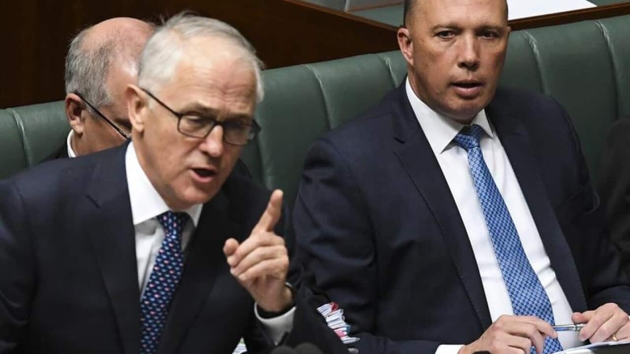 Malcolm Turnbull and Peter Dutton in parliament in August.