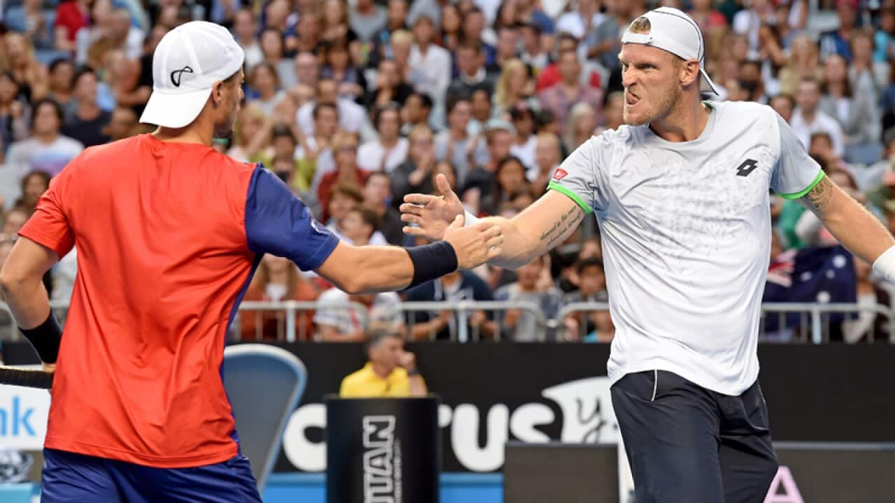 Lleyton Hewitt and Sam Groth of Australia celebrate