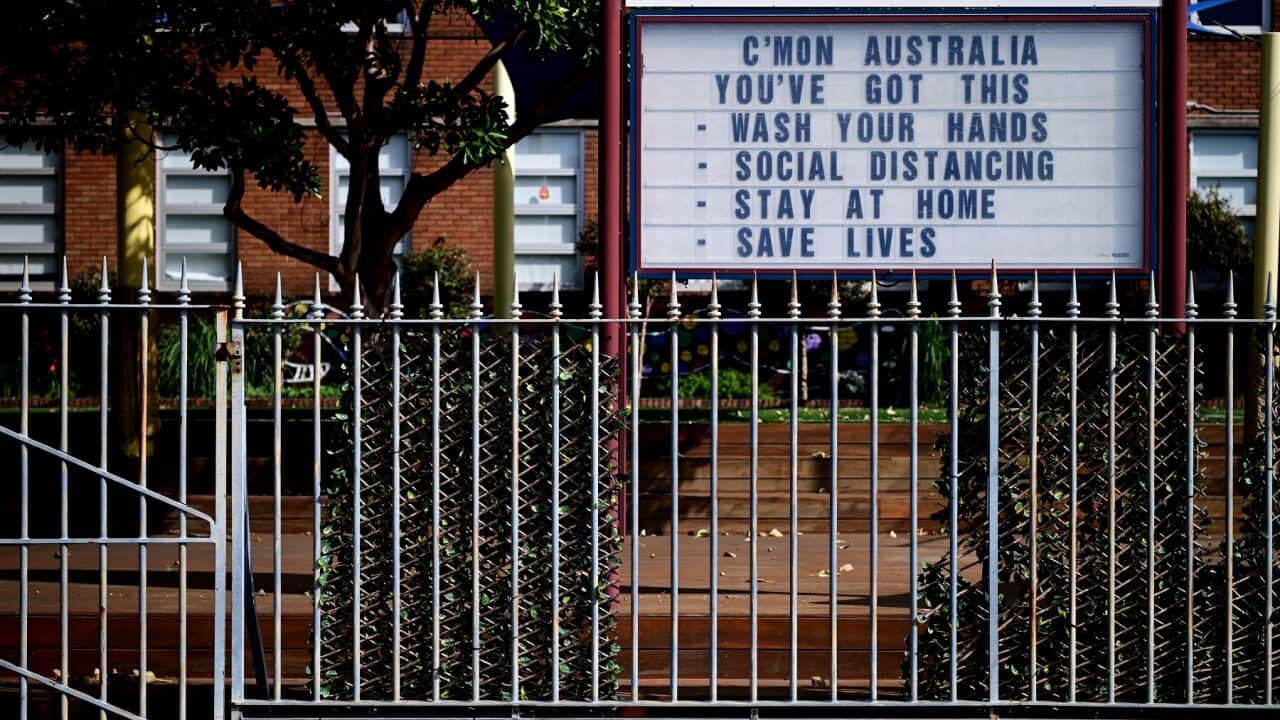 A sign with tips to fight the Coronavirus at a school at Observatory Hill in Sydney