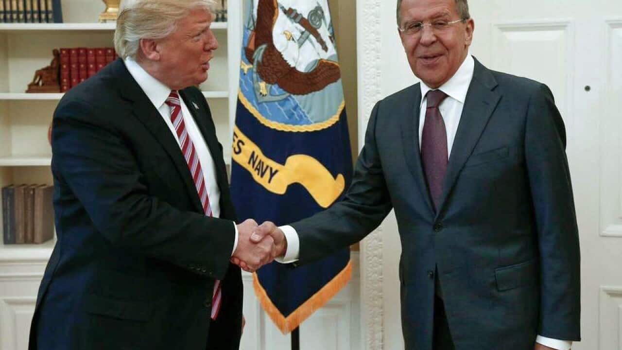 President Donald Trump shakes hands with Russian Russian Foreign Minister Sergey Lavrov in the White House in Washington, Wednesday, May 10, 2017.