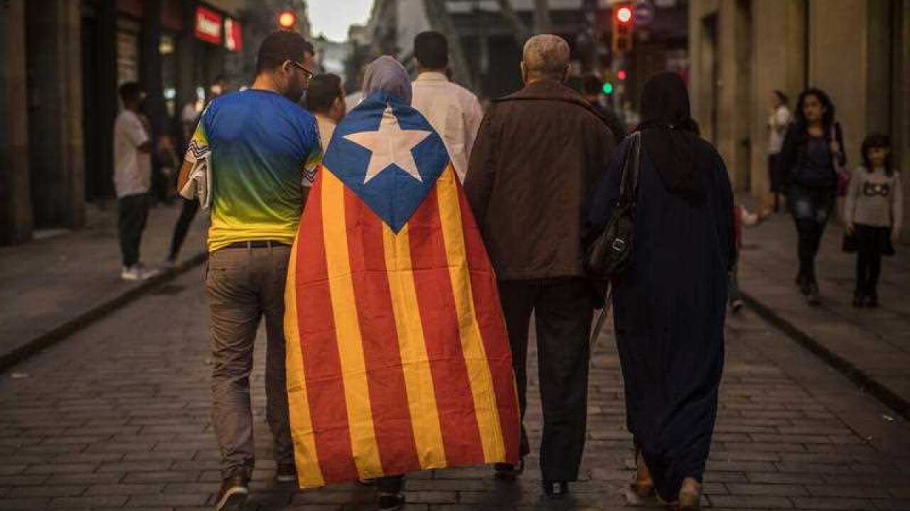 Residents of Barcelona walking downtown