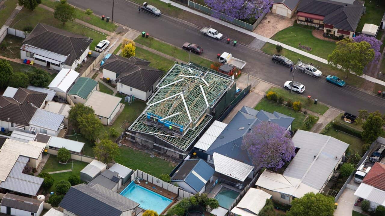 Aerial view of construction work and housing in Western Sydney