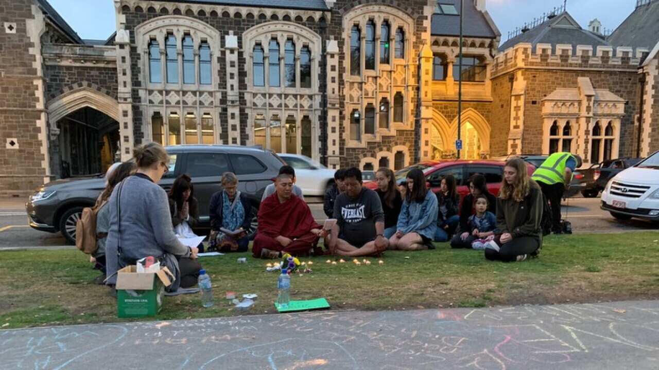 An interfaith prayer session outside the Christchurch memorial, following the shooting.