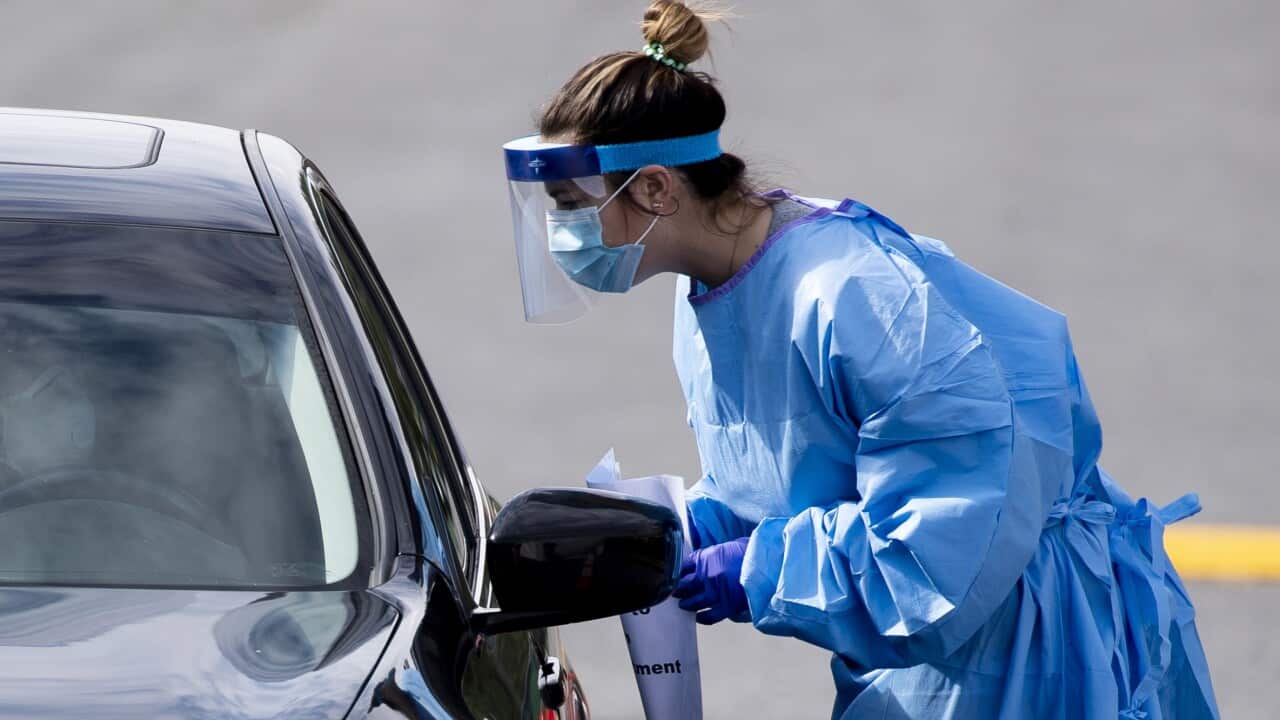 A person arrives at a new drive-thru coronavirus testing site in Maryland in the US.