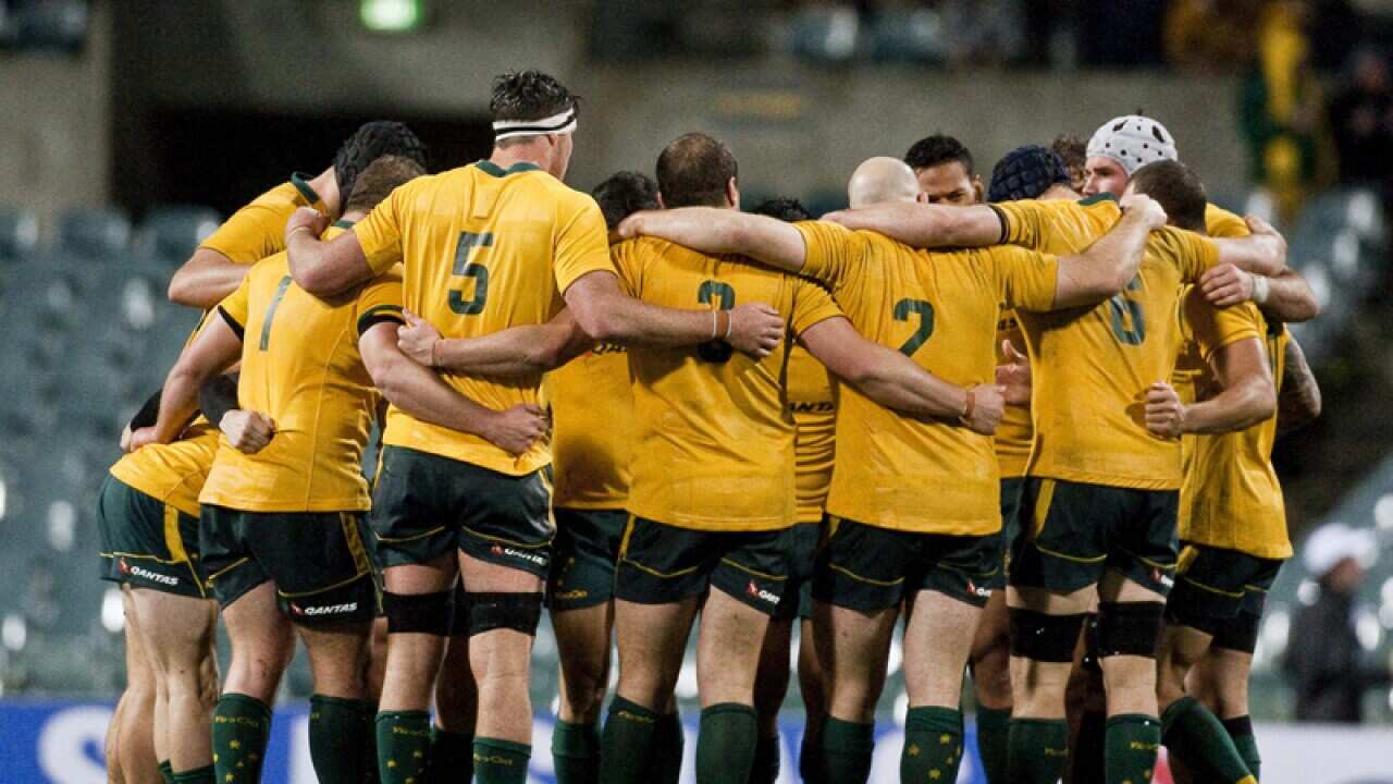 The Wallabies huddle during the Rugby Championship