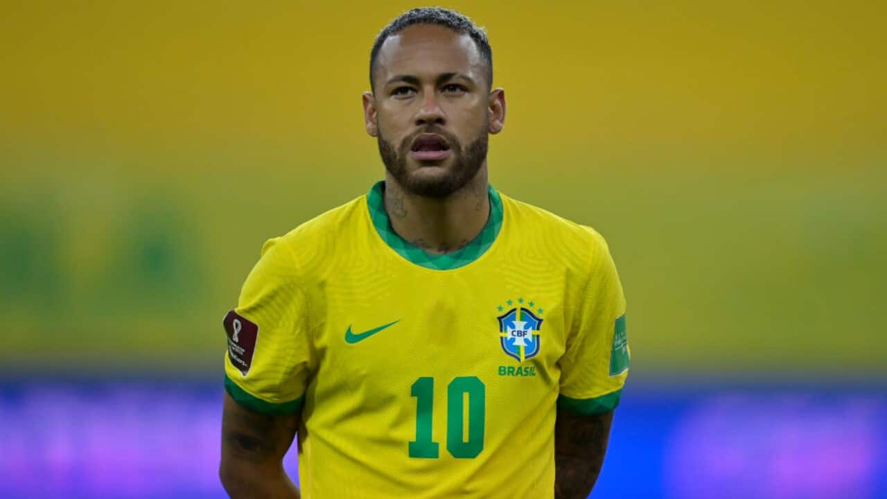 Neymar looks on before a Brazil match