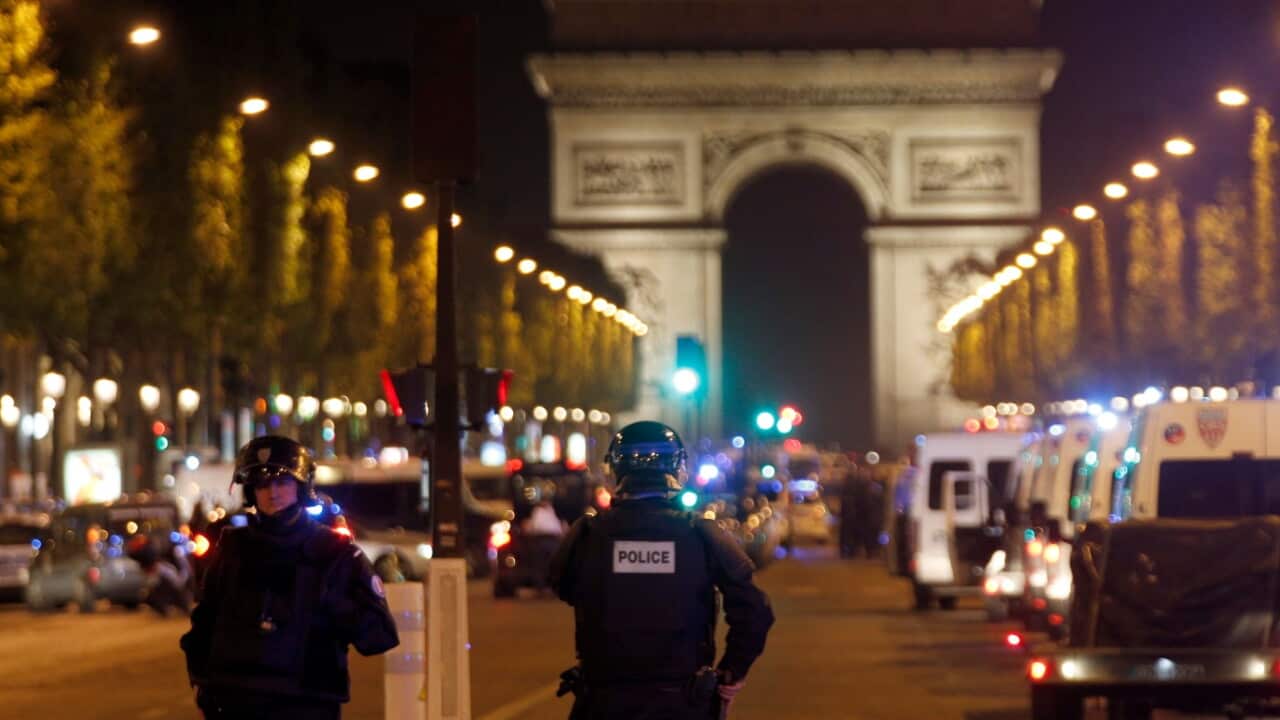 Police seal off the Champs Elysees avenue in Paris, France, after a fatal shooting in which a police officer was killed along with an attacker (AAP)