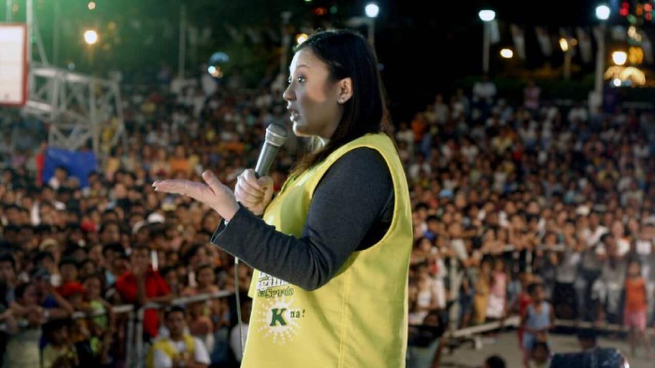 Sharon Cuneta, a Filipina actress, campaigns for her husband