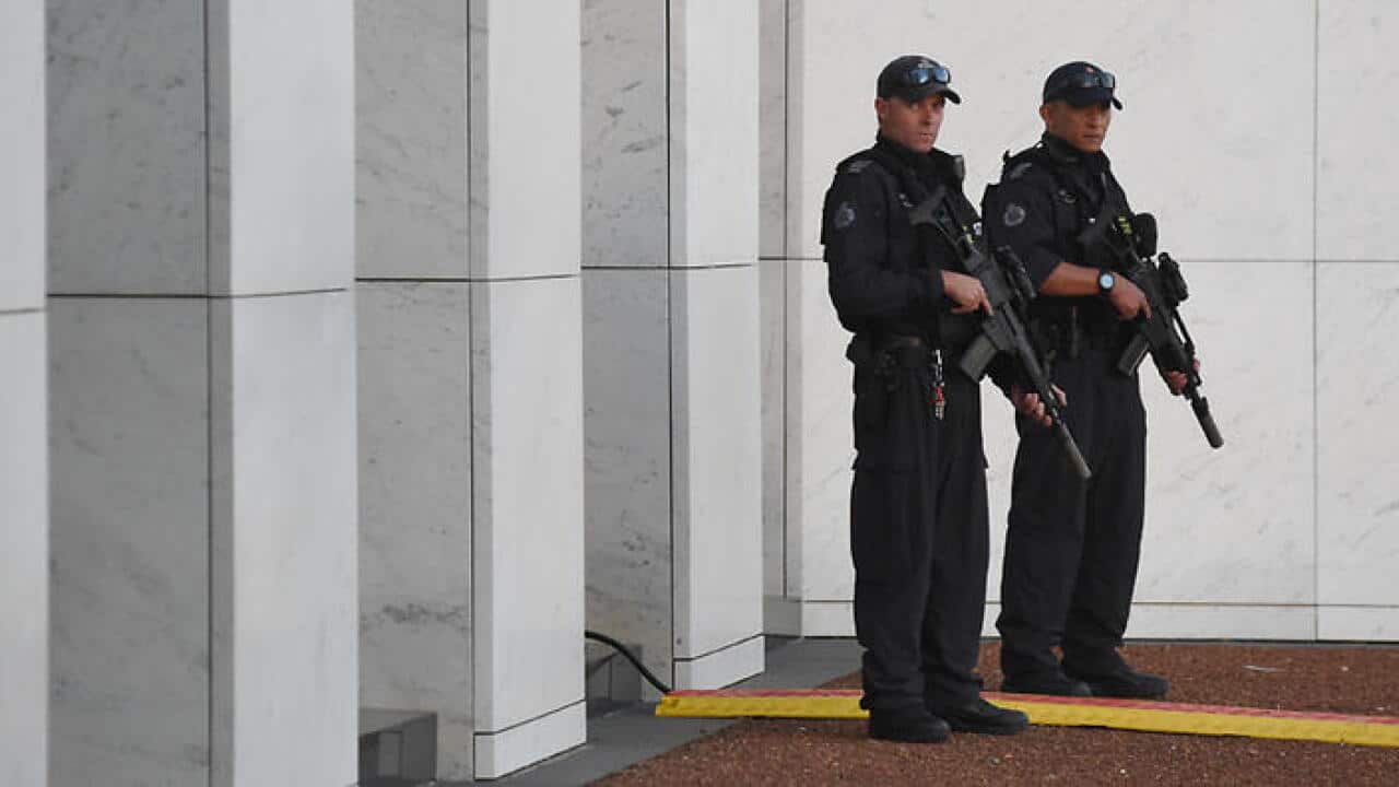 Armed Australian Federal Police officers
