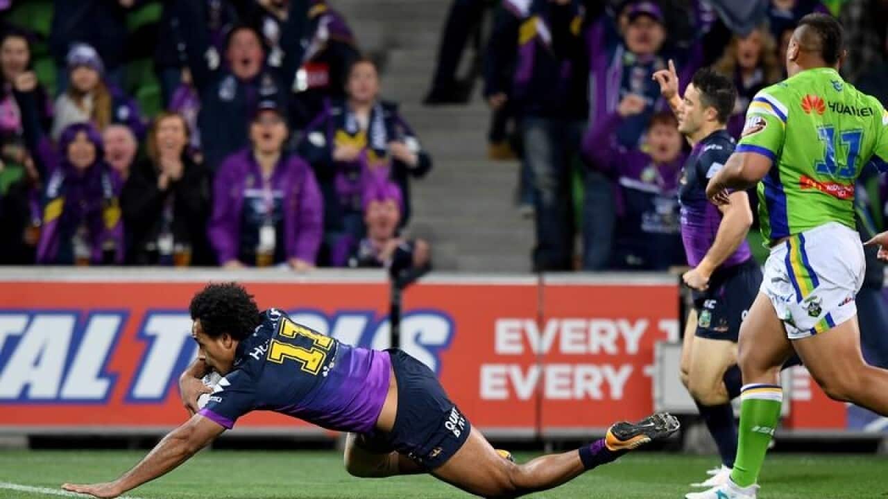 Felise Kaufusi of the Storm scores a try.