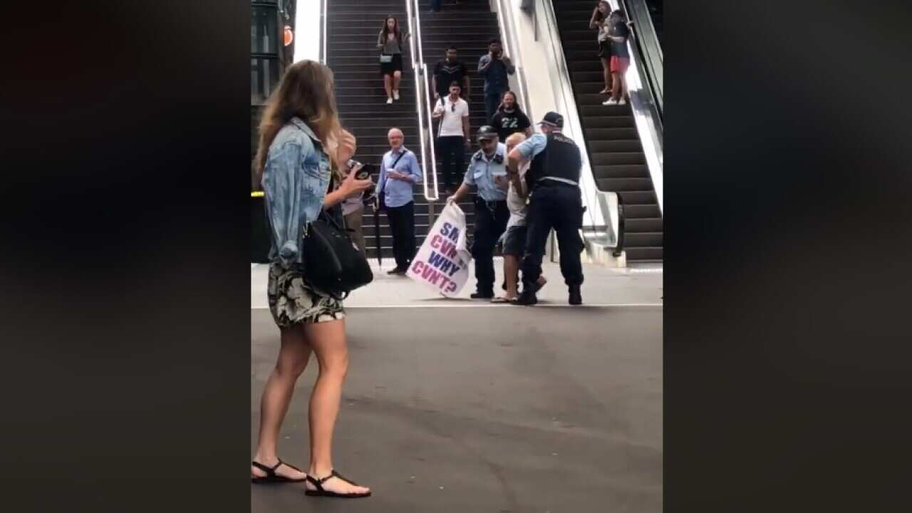 Danny Lim was arrested by three police officers.