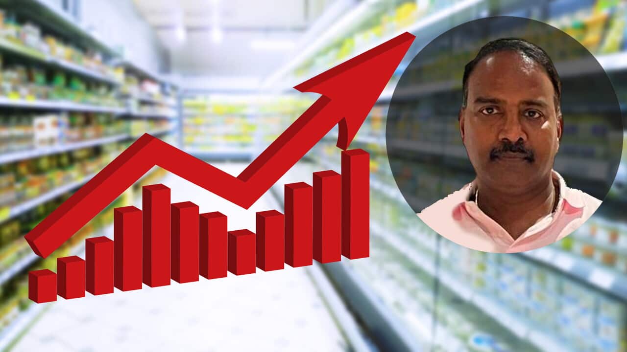 Red growing up large arrow on abstract blur supermarket background. Bar charts and graphs. Rising food prices. Inflation concept. Retail industry. Economy. Stock Market. Grocery Store. Recession. CPI.