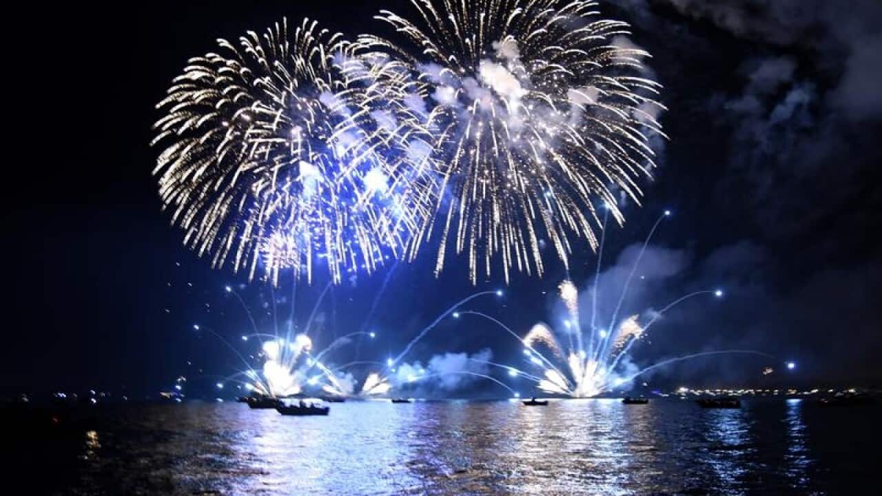 Fireworks are seen over Darwin Harbour
