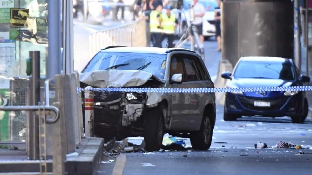 A damaged vehicle is seen at the scene of an incident in Melbourne