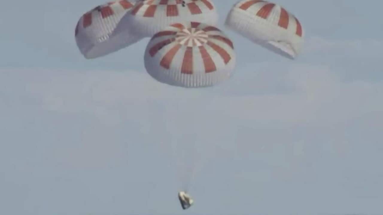 SpaceX's Dragon capsule splashes down in the Atlantic