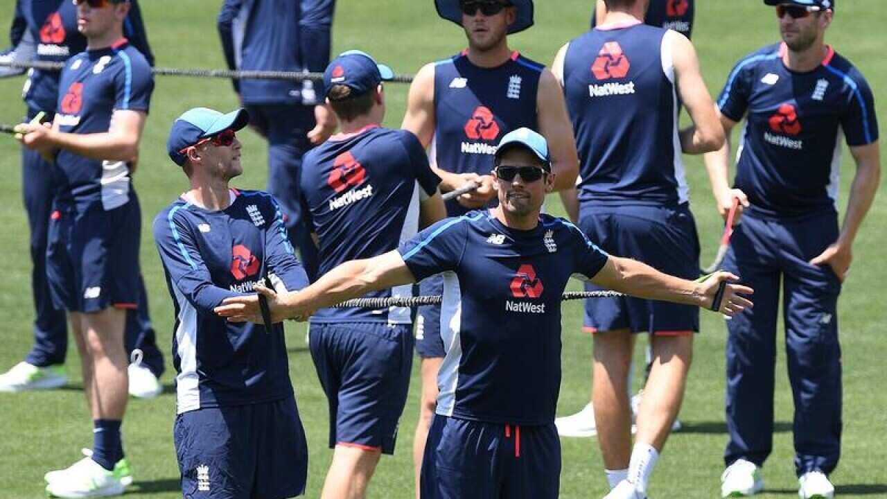 Joe Root and Alastair Cook (c) during England team training.