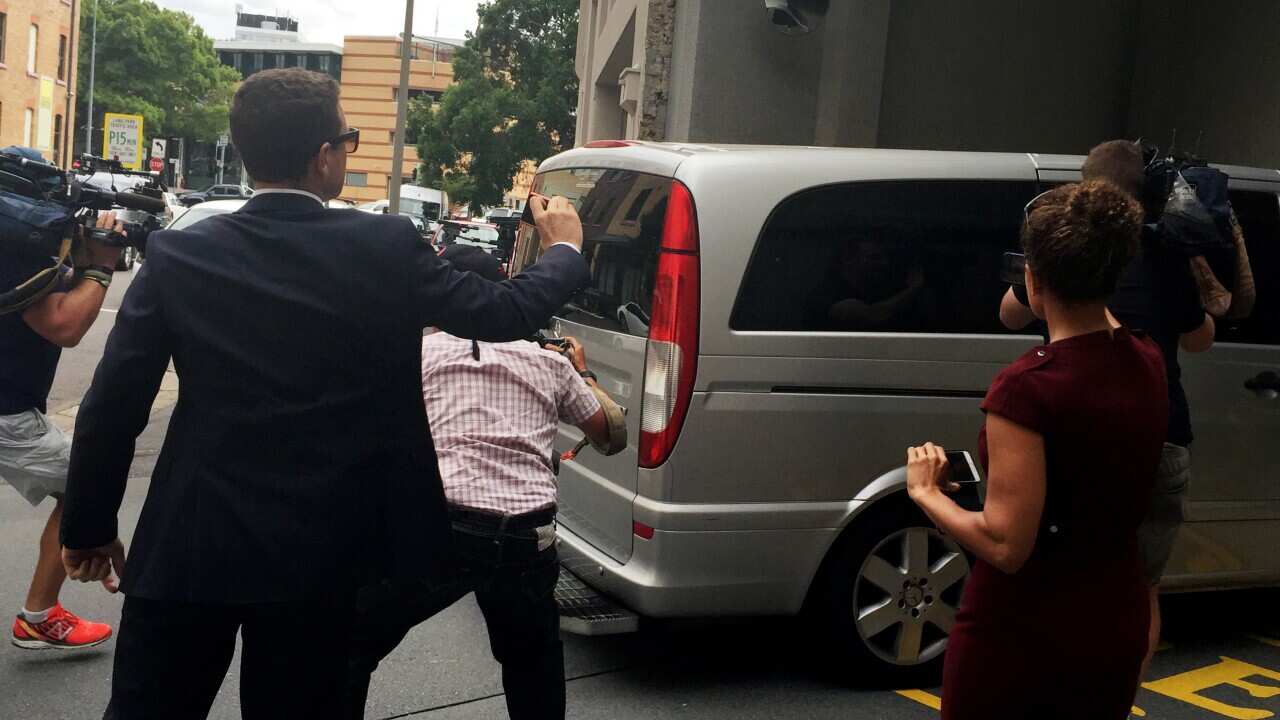 A Queensland correctional van believed to hold Brenden Abbott, also known as the Postcard Bandit, on Tuesday, April 12