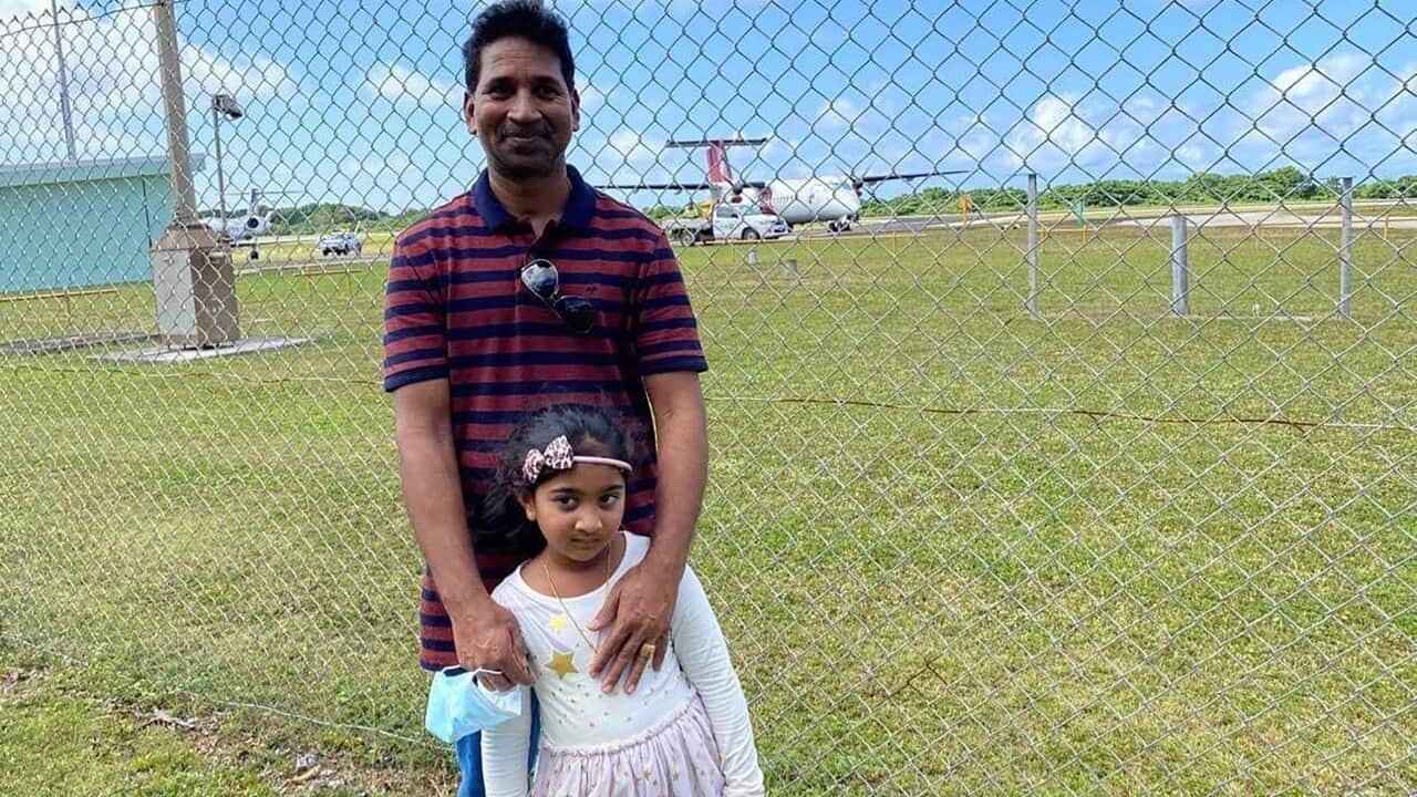 A supplied image, Tuesday, June 15, 2021, of Nades and Kopika of the Biloela family boarding a plane bound for Perth.