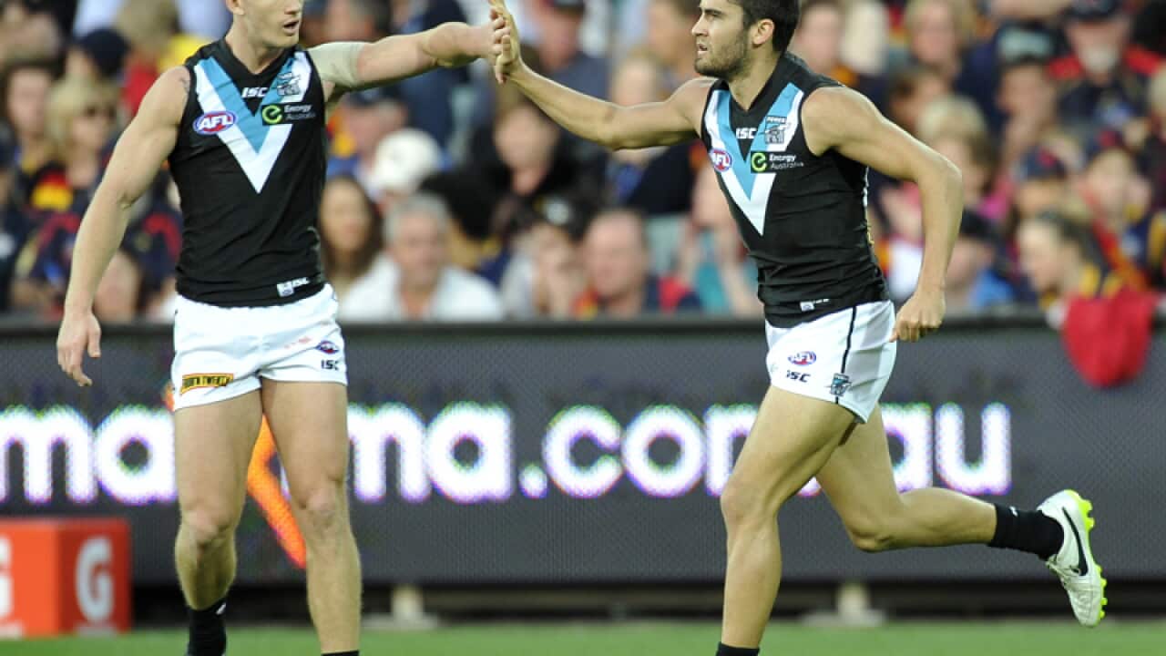 Port Adelaide duo Chad Wingard (R) and Hamish Hartlett