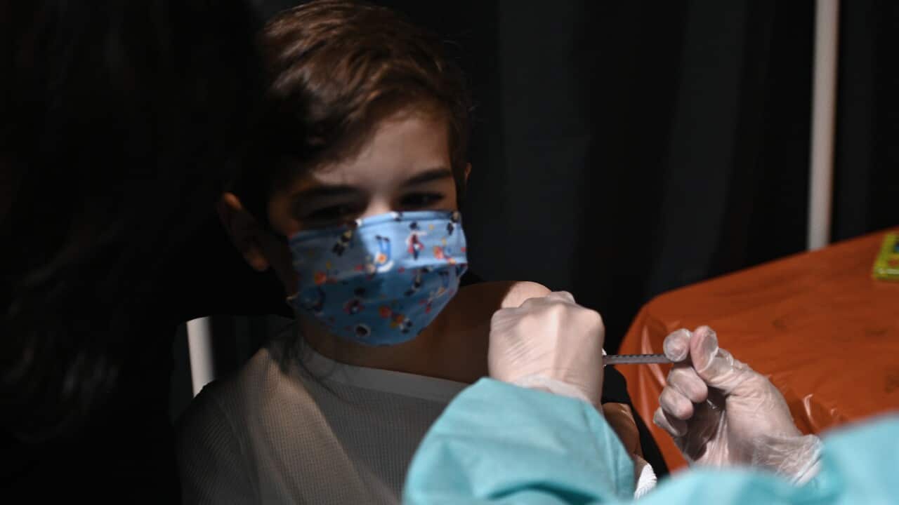 Spencer, 8, receives his second dose of the COVID-19 vaccine inside the American Museum of Natural Historys kids vaccination site, New York, NY, November 29, 2021. Millions of children have already been vaccinated against COVID-19 in the United States sin