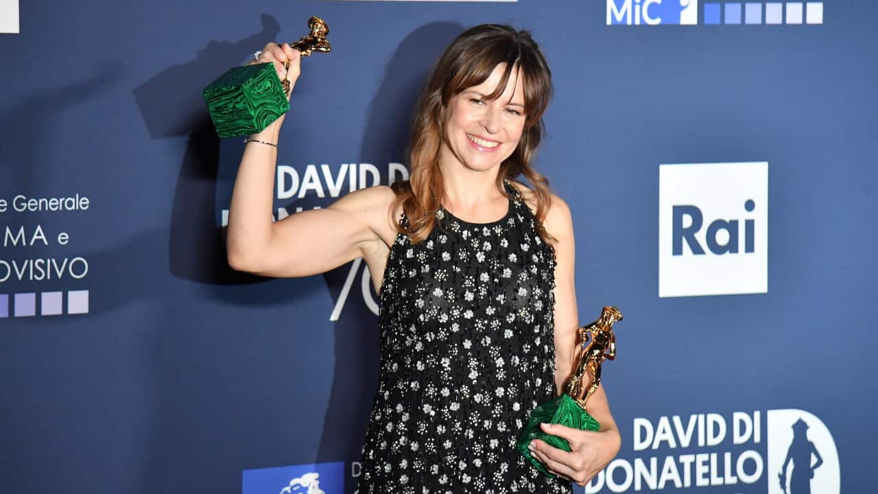Director Maura Delpero poses with Best Film, Best Director and Best Original Screenplay awards for her film 'Vermiglio' during the 70th edition of the David di Donatello Awards at Cinecitta Studios in Rome, Italy, 07 May 2025