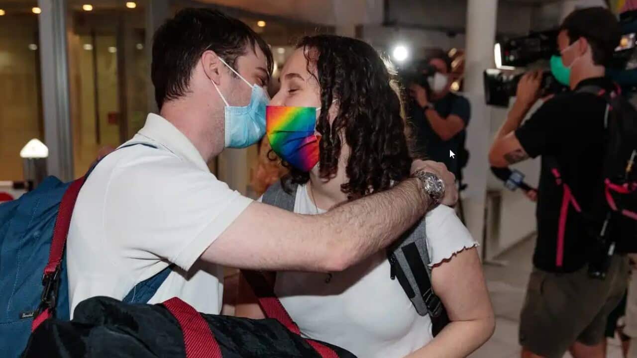 Passengers arrive at Perth Domestic Airport and are embraced by loved ones as the state's borders reopened after being closed for almost two years.