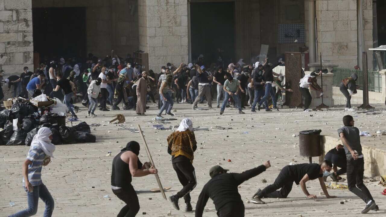 Palestinians clash with Israeli security forces at the Al Aqsa Mosque compound in Jerusalem's Old City