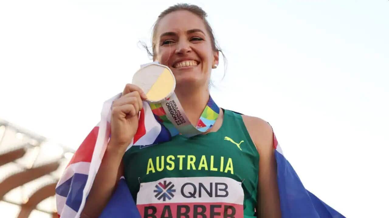 Kelsey-Lee Barber celebrates after winning the gold medal at the World Athletics Championships