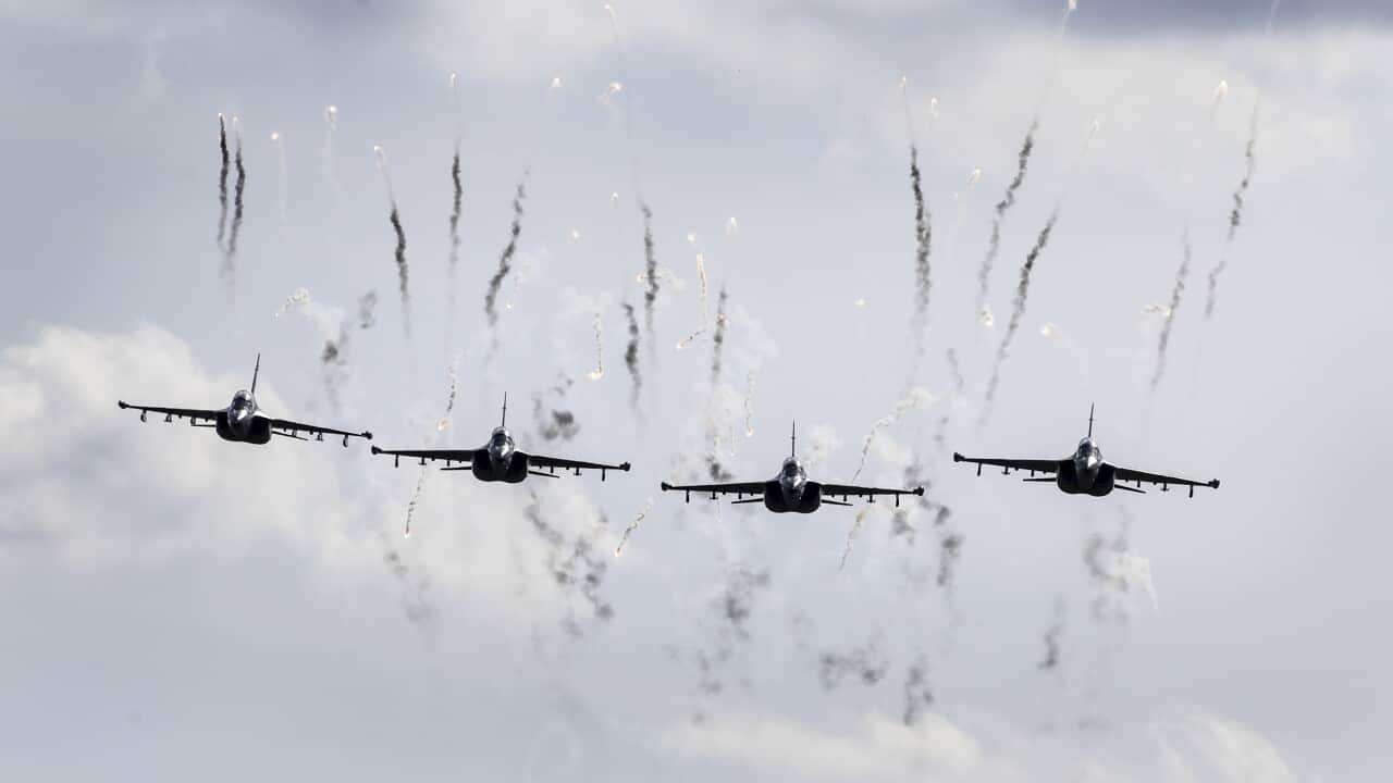 FILE: Military jets fly during military exercises, near the Volka village